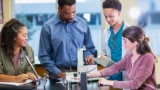 Physics teacher in secondary school with three pupils