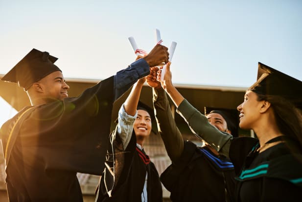 graduates celebrating