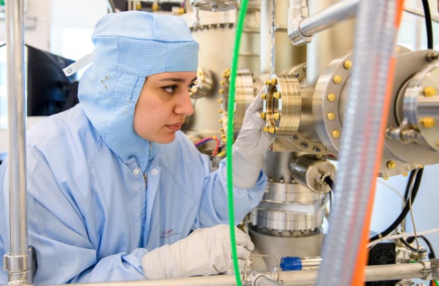 Elham Fadaly in the lab in a clean suit