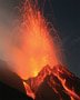 Photo of a volcanic eruption with bright orange lava