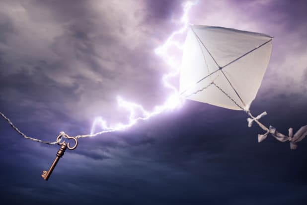 lightning strikes a key tied to a kite