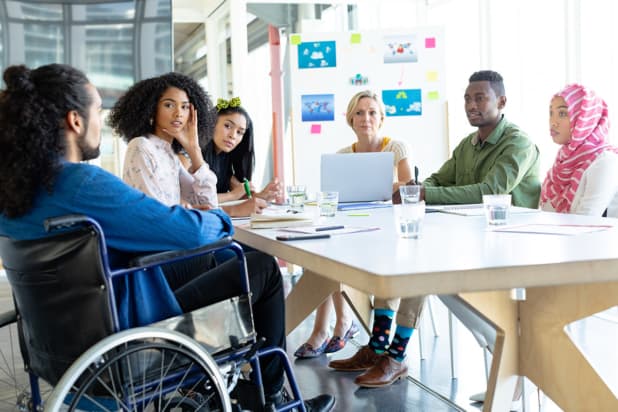 Wheelchair user in a meeting